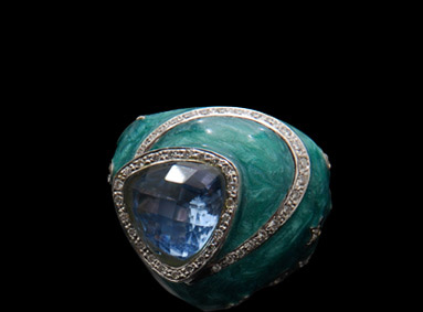 Blue Topaz surrounded by diamonds Blue Topaz surrounded by diamonds