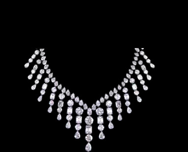 Necklace with solitaries, emerald and pears Necklace with solitaries, emerald and pears